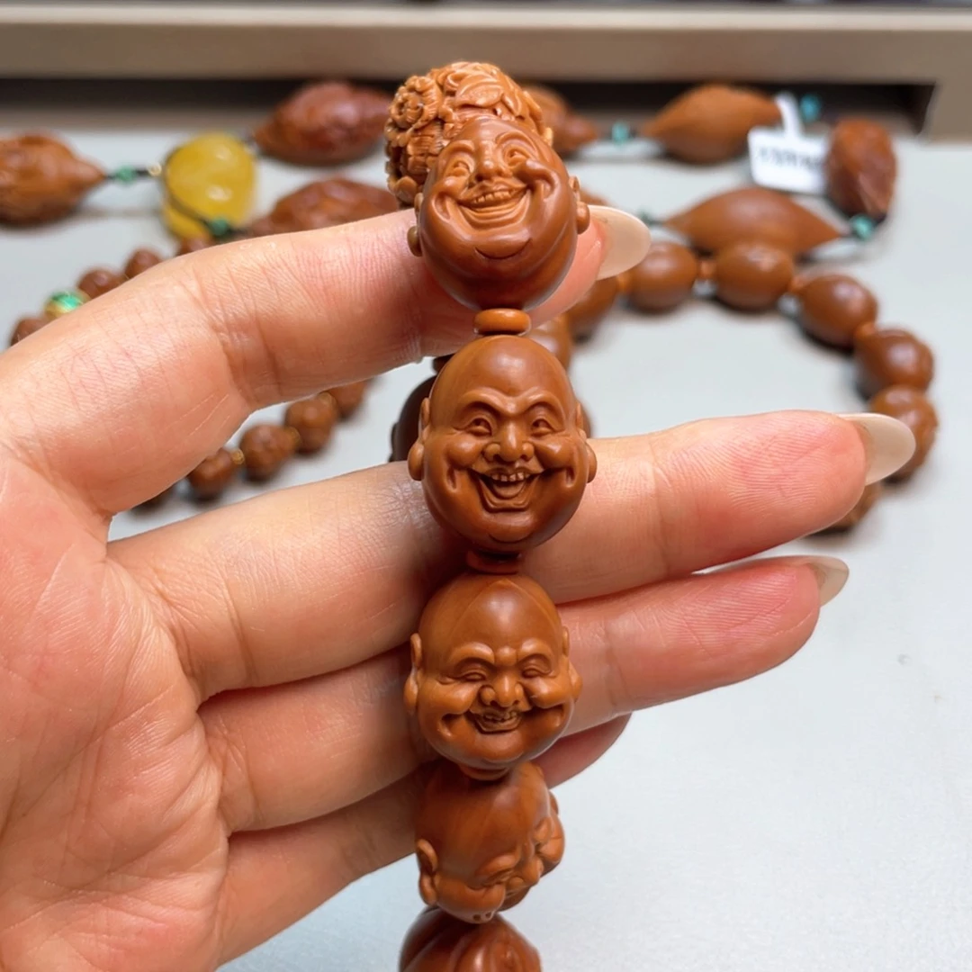 橄榄核吊坠预定笑口常开