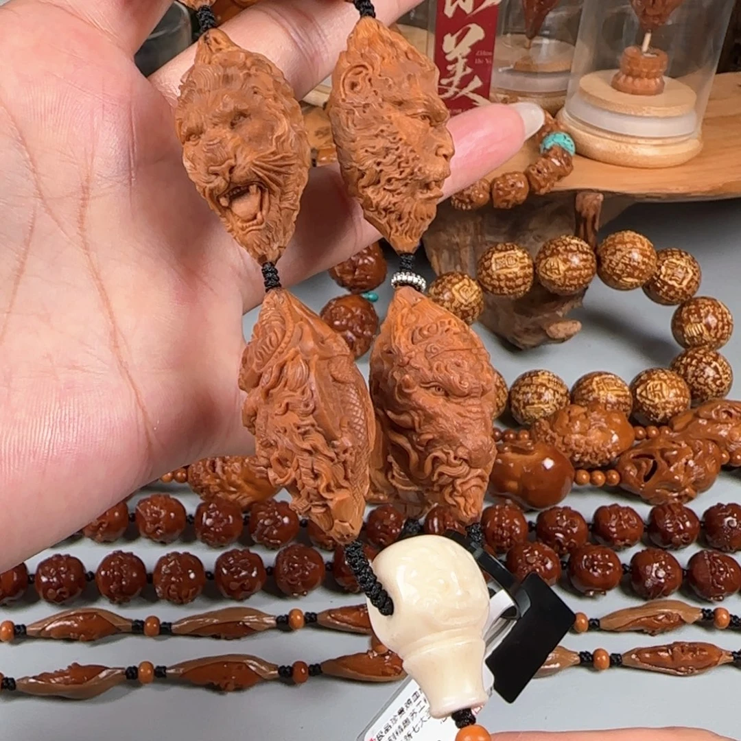 橄榄核手串/手链宽2.2鸡血红水晶核七大圣手持