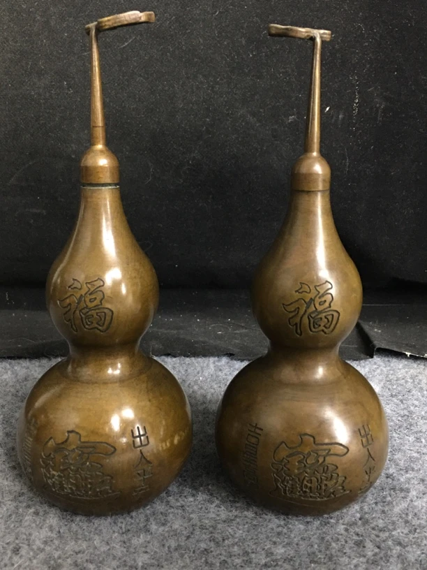铜精制招财进宝葫芦一对，重量尺寸咨询客服。