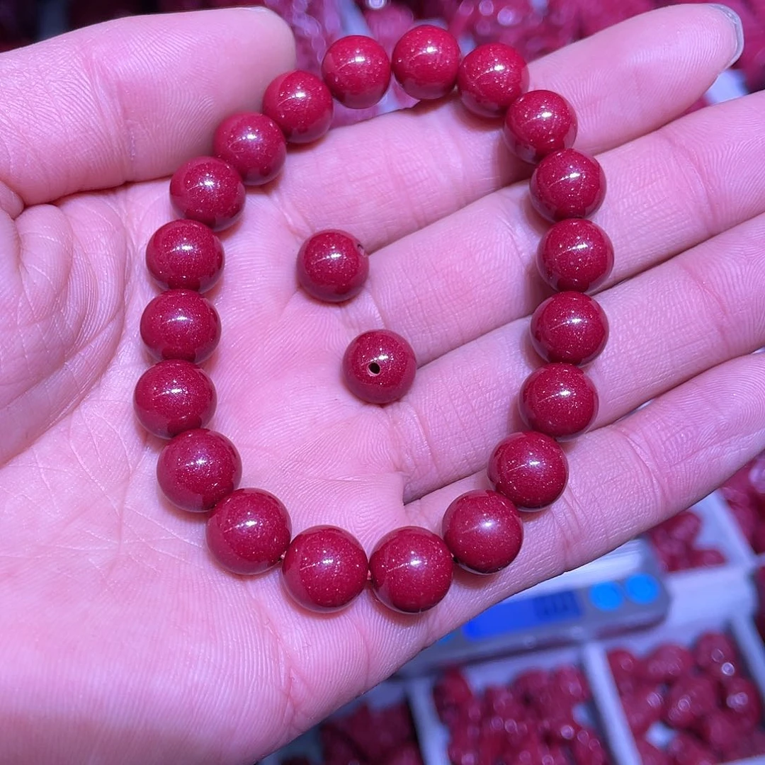 天然辰砂紫金砂10毫米22颗送一颗