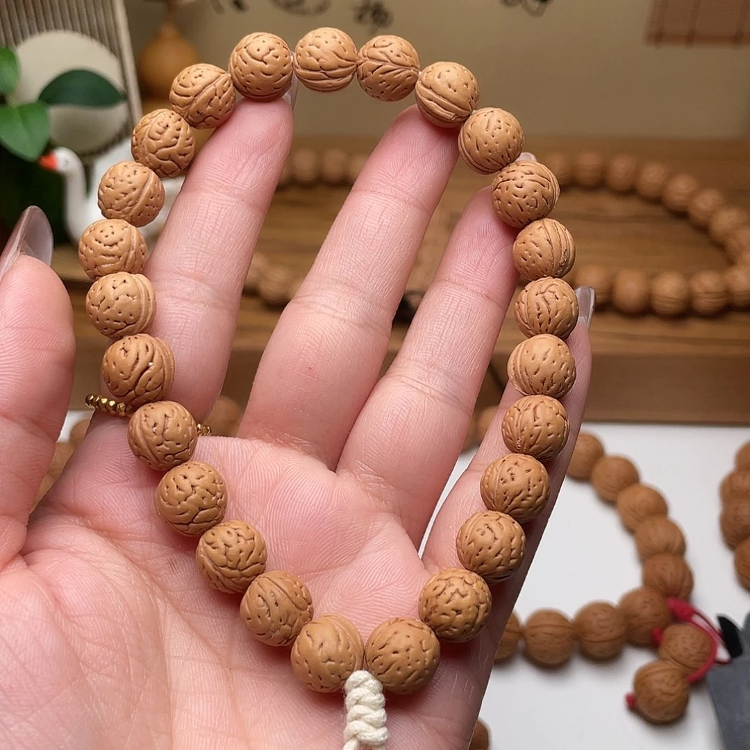 10加野生小奶豆桃核手持