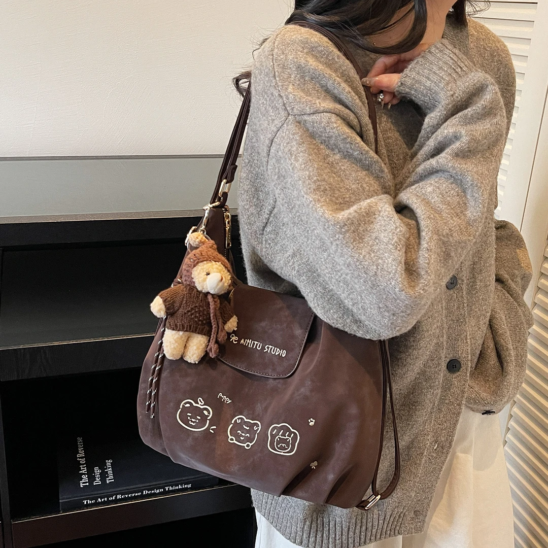 艾米兔女包2025新款简约百搭复古刺绣休闲单肩包潮流时尚双肩包