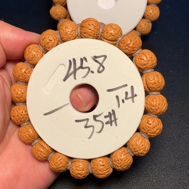 桃核手串35号健健康康了