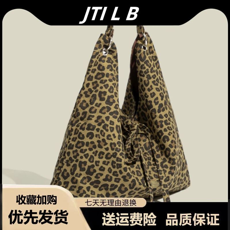 秋冬季豹纹包包2025新款通勤百搭单肩包女式大容量托特包帆布女包