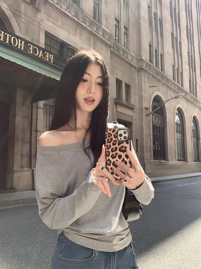 斜肩上衣女长袖宽松显瘦慵懒风高级感气质修身两穿露肩设计感T恤