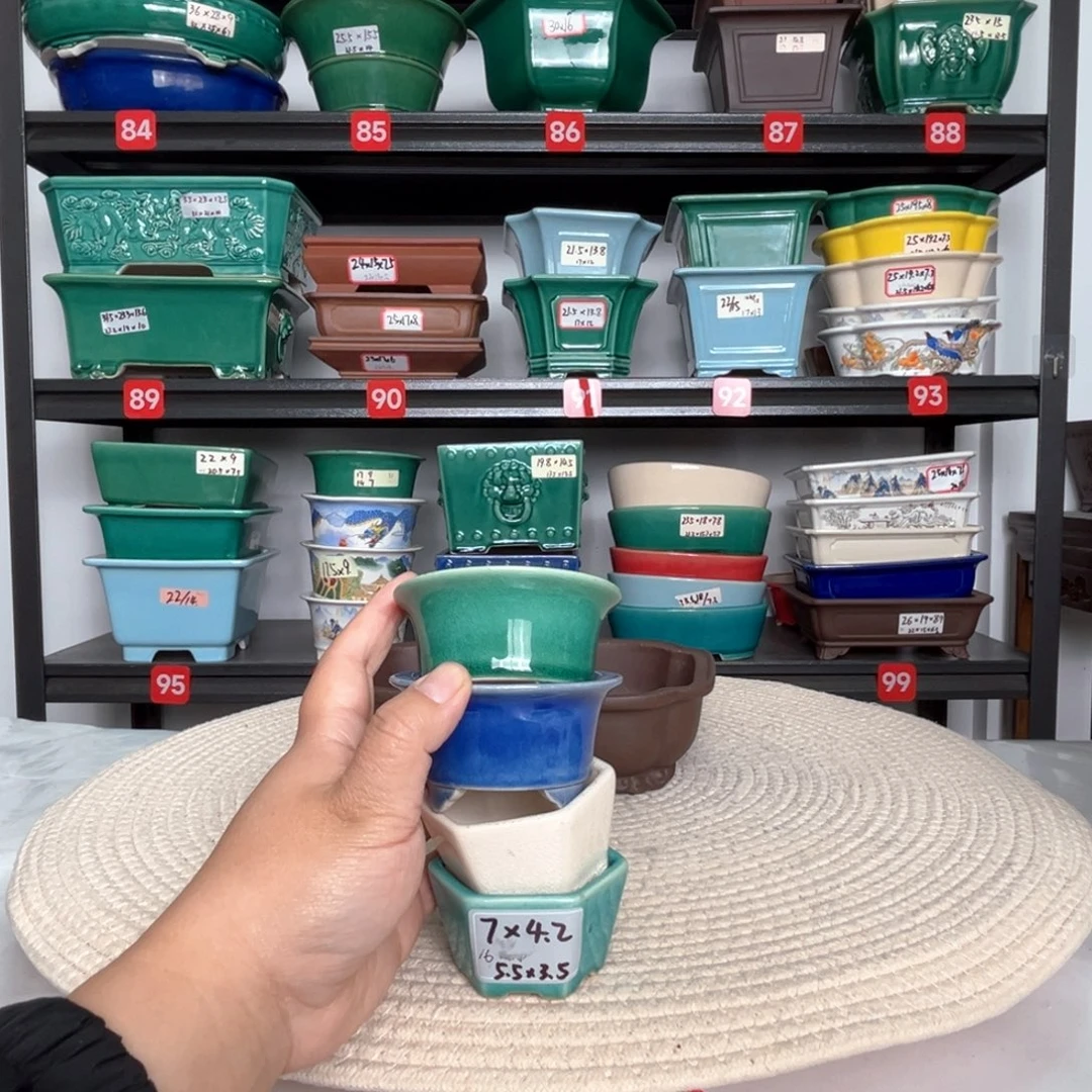 挚***。宜兴紫砂花盆链接