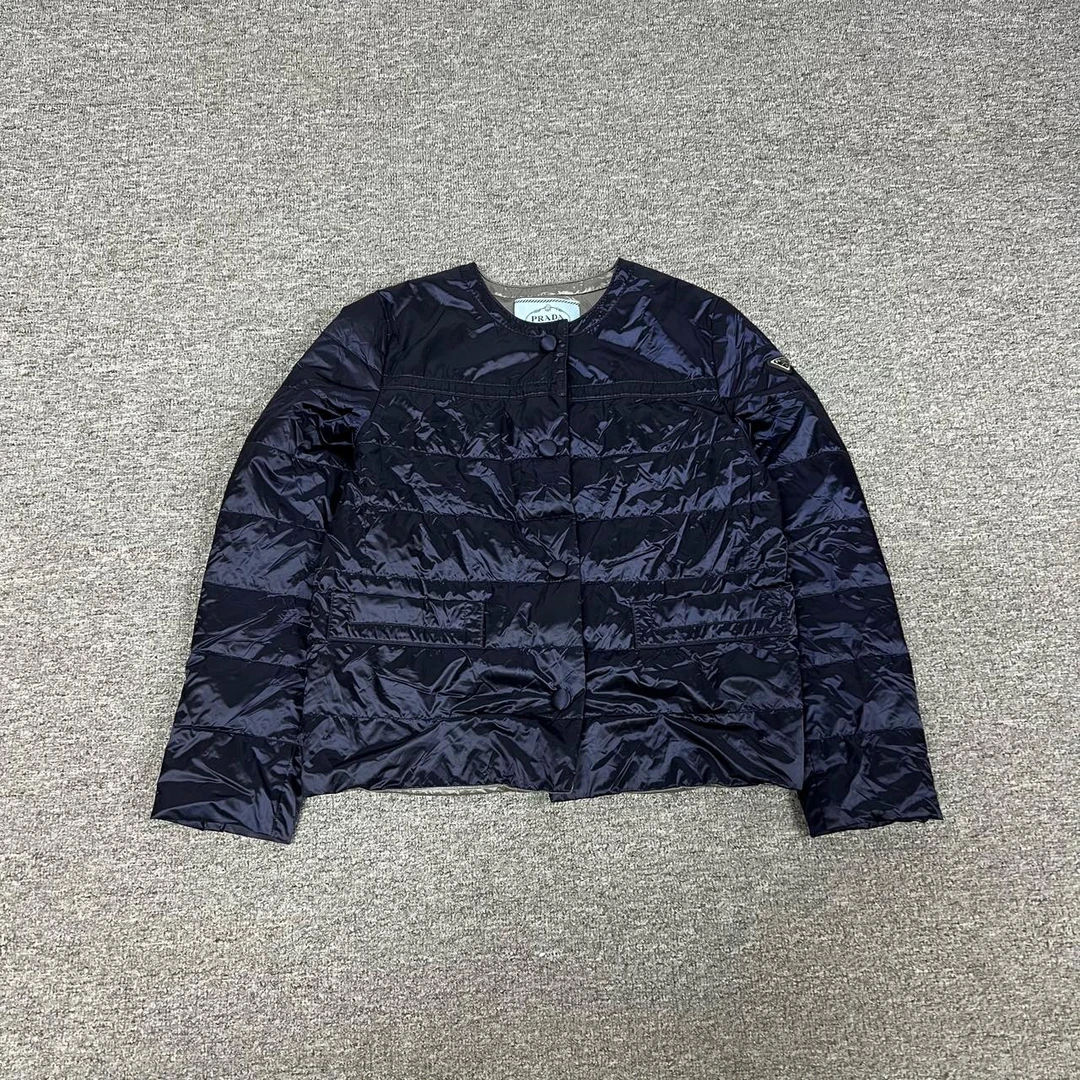 99新 Prada/普拉达 Prada 轻薄羽绒服42码