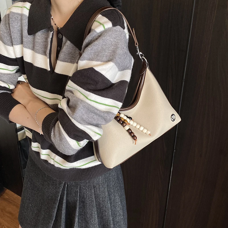 时尚简约单肩包2025新款潮流网红气质百搭腋下包轻奢通勤斜挎包女