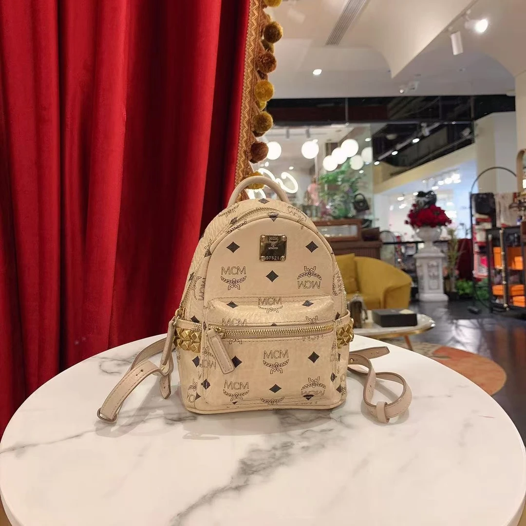 95新 MCM GGS 萌萌丨双肩书包小号米色老花/67770199