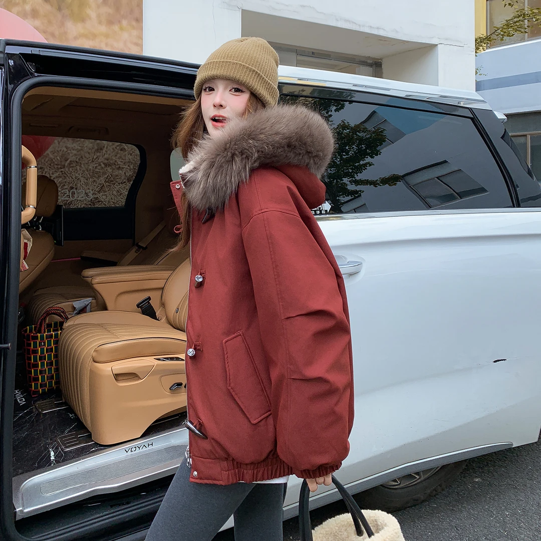 韩系复古大毛领设计感羽绒服女2025新款冬季保暖牛角扣白鸭绒外套