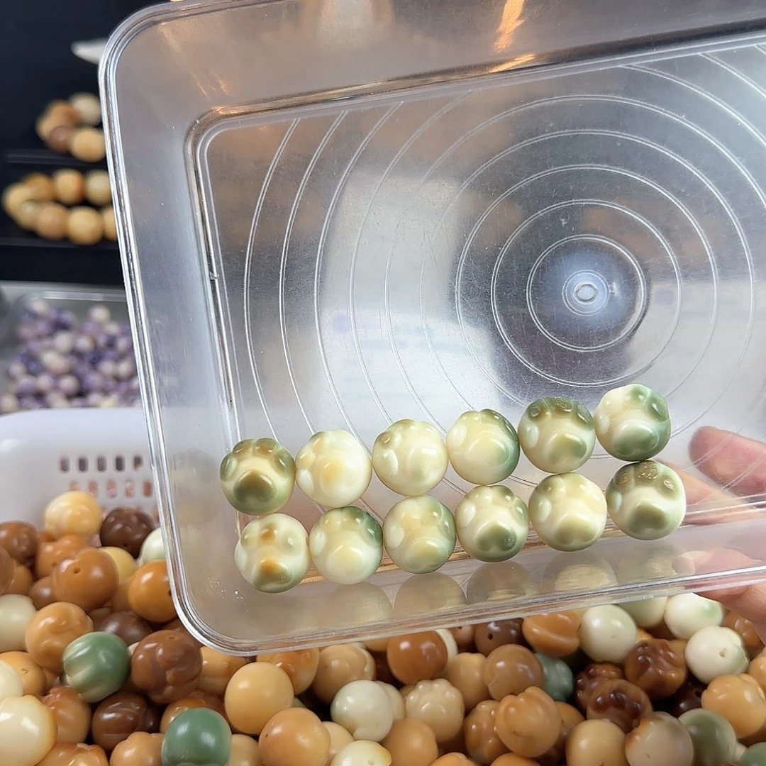 菩提根/象牙果手串阿***优瑕疵卡21爱心猫抓2颗