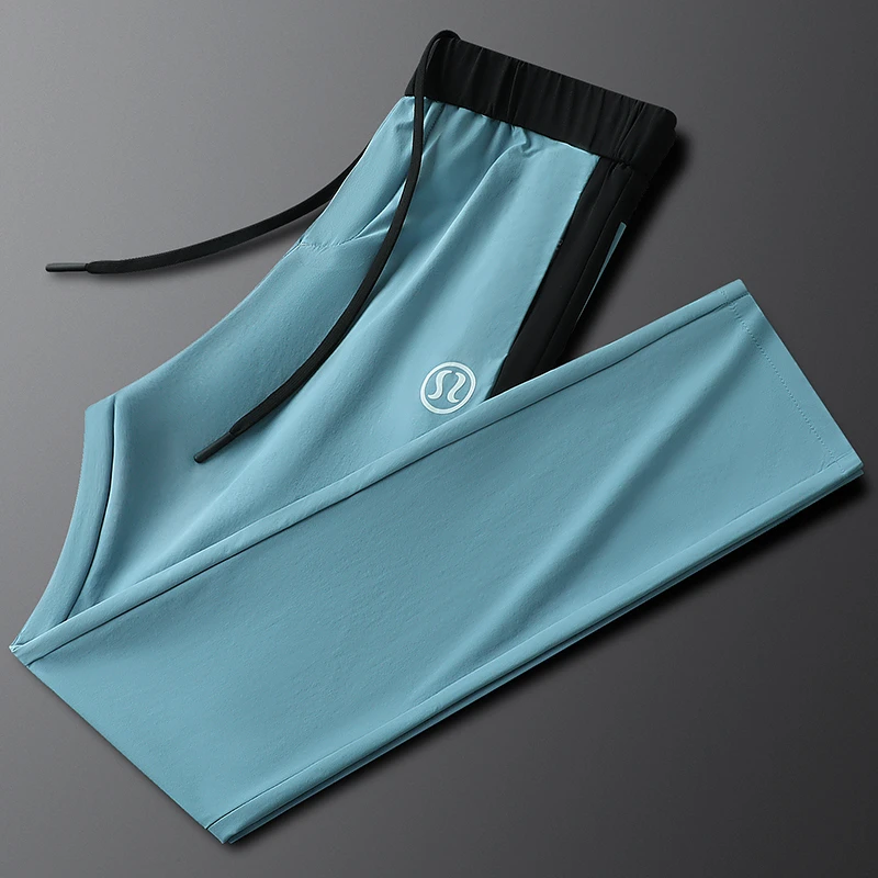 轻奢男士拼接撞色运动休闲裤夏季薄款修身弹力冰丝速干小直筒长裤