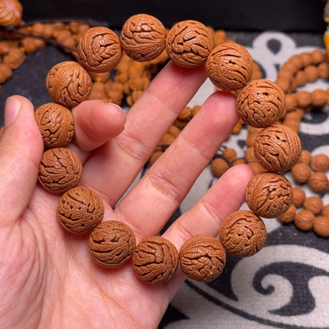 桃核手串龙纹绣球16