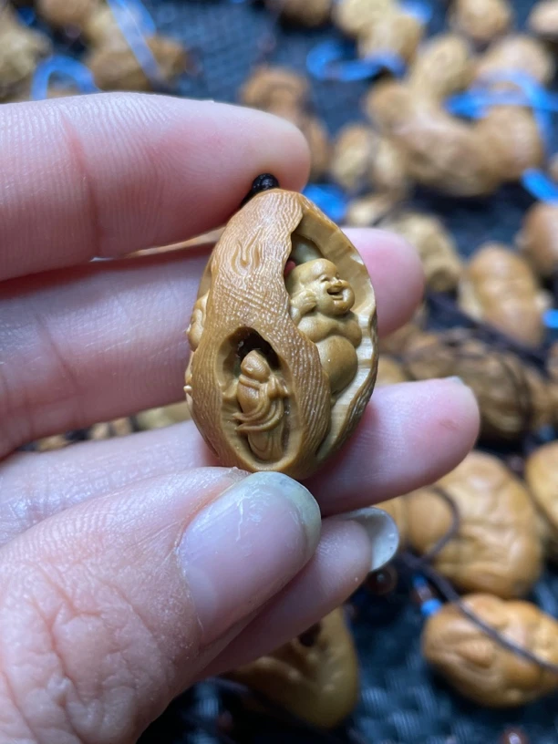 橄榄核单粒镂空三面佛