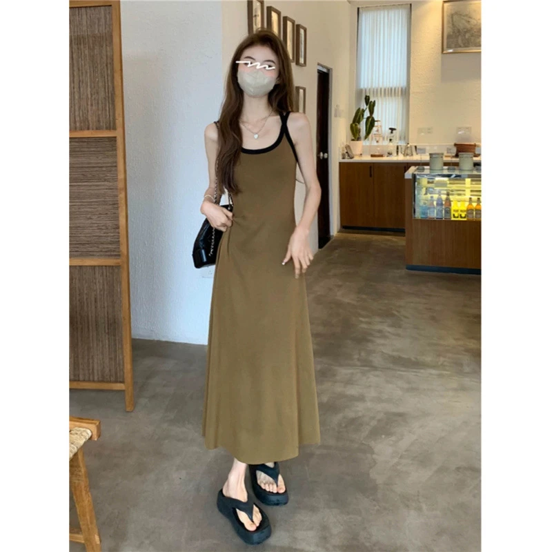 夏季显瘦气质时尚轻熟小众设计感吊带裙女装收腰中长款撞色露背针