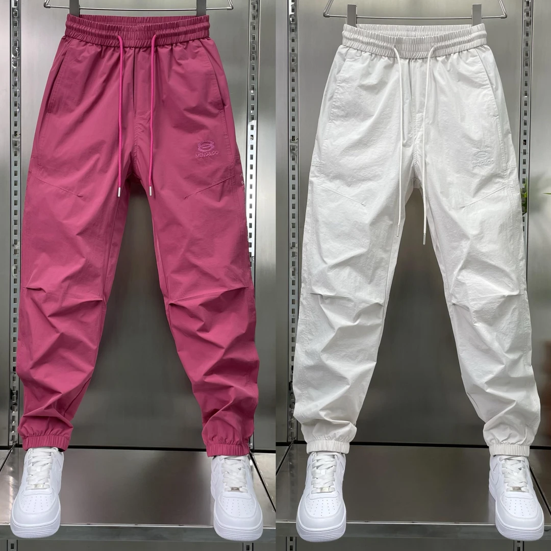 男士新款薄款透气休闲裤纯色百搭网眼束脚裤弹力松紧腰小脚哈伦裤