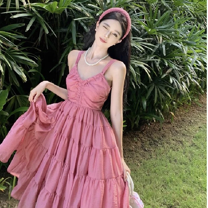 度假风连衣裙2025夏季露背设计感甜美粉色高腰海边长裙优雅显瘦收