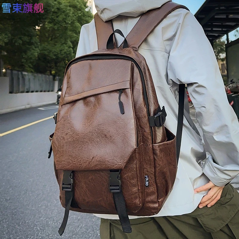 防水软皮男士商务双肩包休闲户外旅行背包大学生书包时尚百搭复古