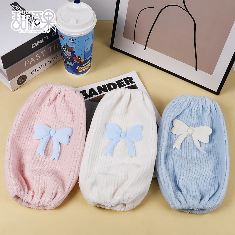 可爱蝴蝶结袖套女冬季2025新款防脏办公室工作羽绒服套袖护袖新款