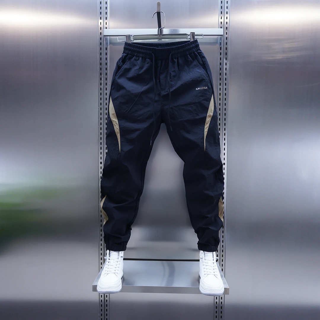 潮流男士夏季薄款拼接速干休闲裤松紧腰束脚裤