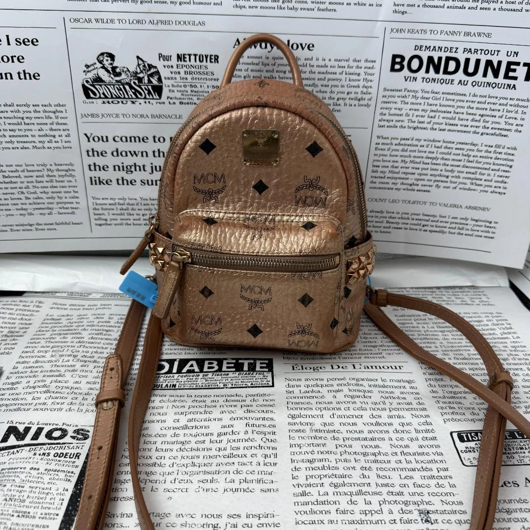 95新 MCM 香槟色双肩包/ZH06417509/7509