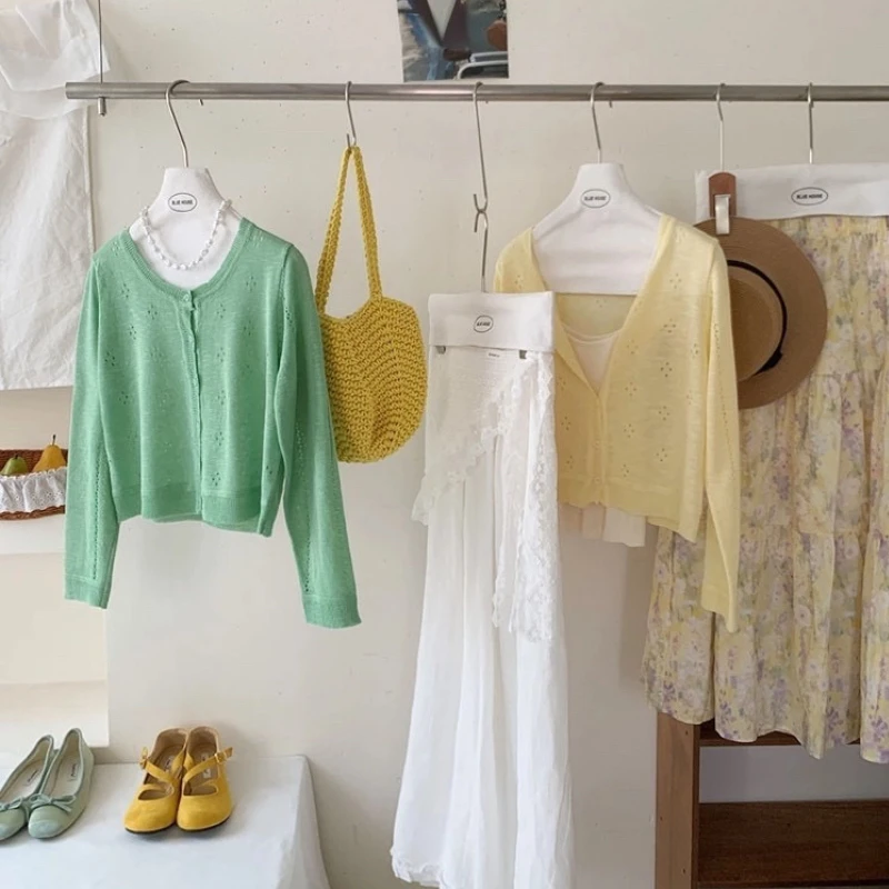 秋季女士薄款清新镂空针织开衫遮阳外搭披肩罩衫气质长袖短款上衣