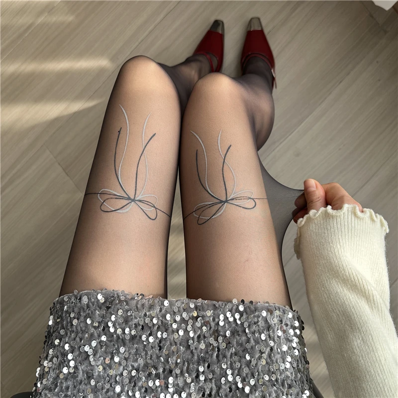 蝴蝶结纹身黑丝袜纯欲性感辣妹黑色连裤袜女ins潮超薄印花打底袜