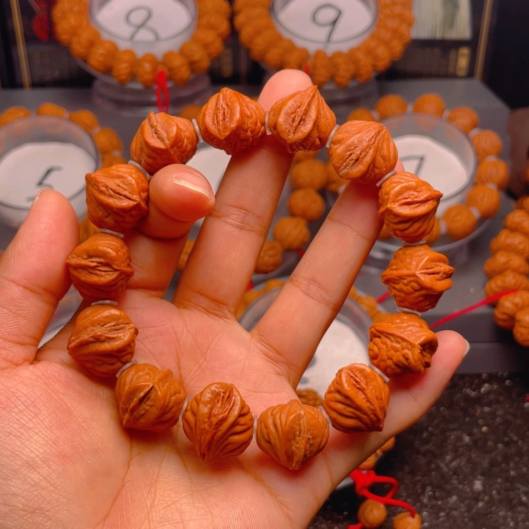 桃核手串生命之源扭转乾坤腰缠万贯