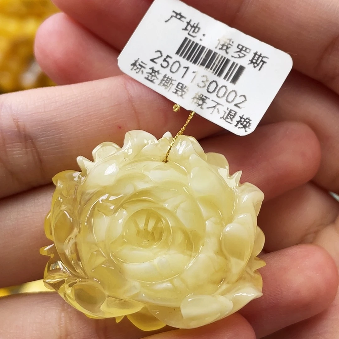 裸石琥珀未镶嵌瑕疵牡丹花9.07g