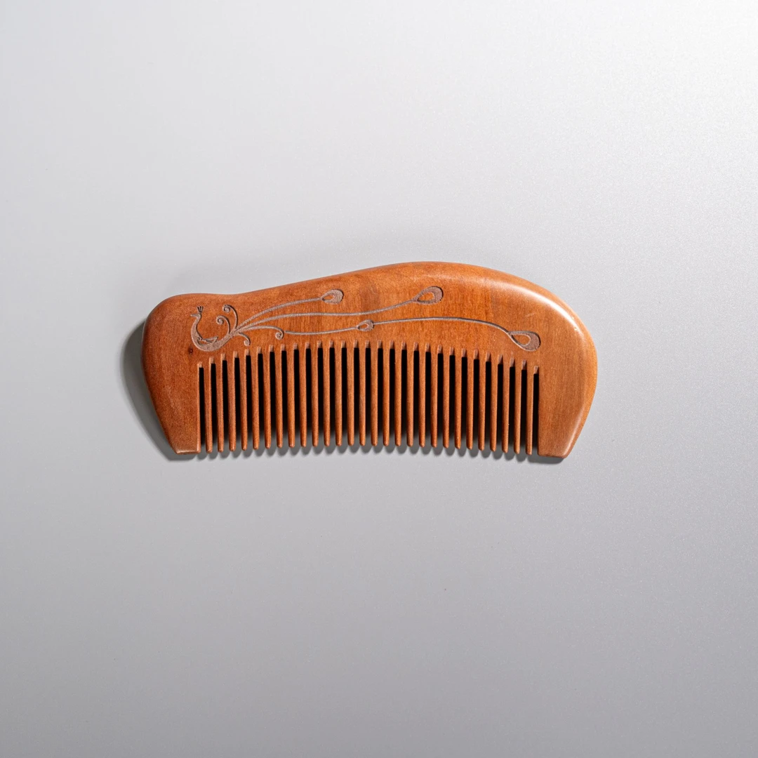 柒玥星遗桃木梳子天然木梳子女士长发专用按摩头皮经络静电防