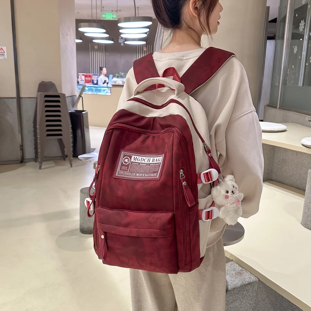 书包女大学生大容量高中撞色初中生小众设计感少女双肩包男生背包