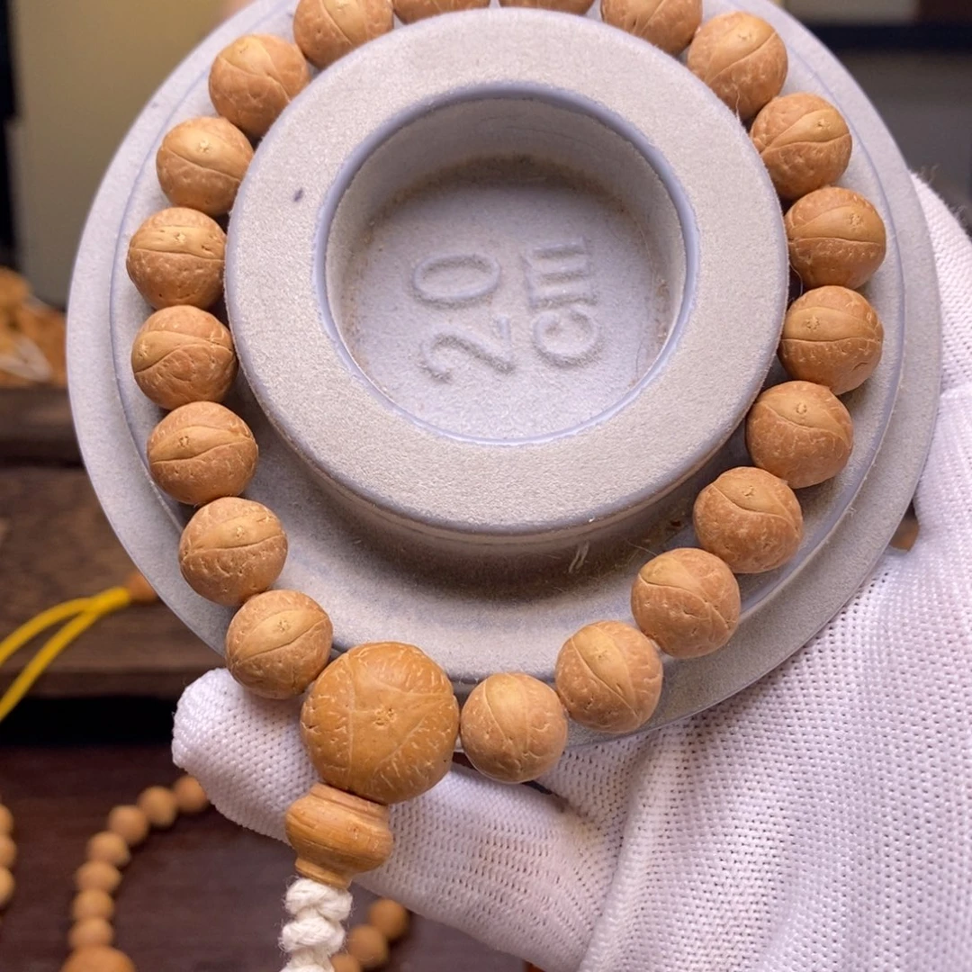 凤眼菩提手串11.9-12.3玉化