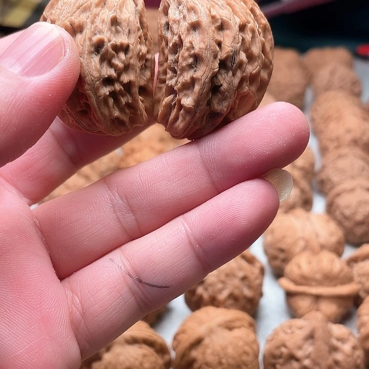 桃核把件清***郎零点文玩磨盘半壁全品