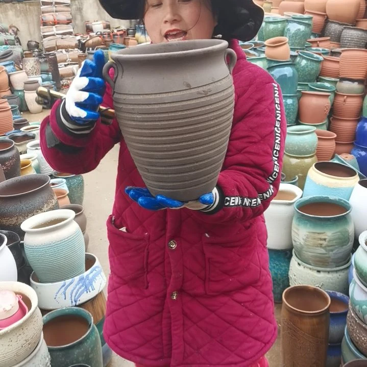 红陶口20高27瑕疵底部烧裂