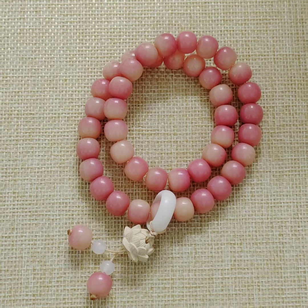 CQ6079杏花粉精选双圈手串