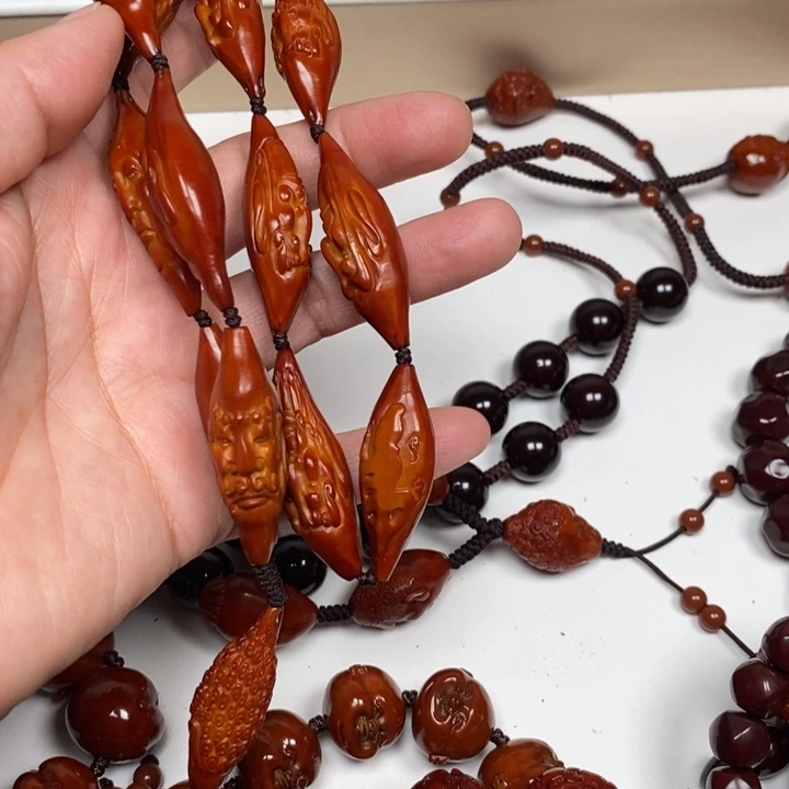 好***号橄榄核手持手串脖挂