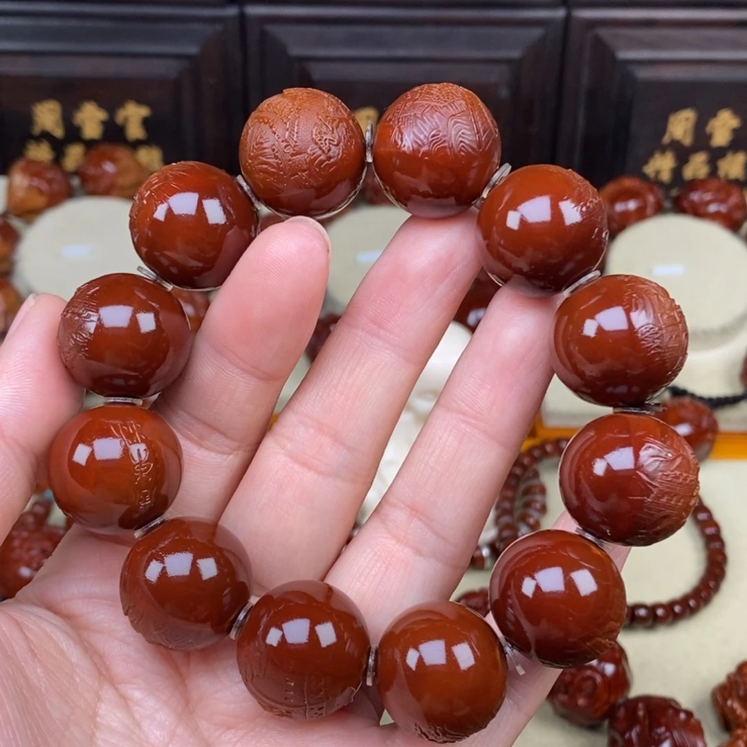 橄榄核吊坠光珠1111