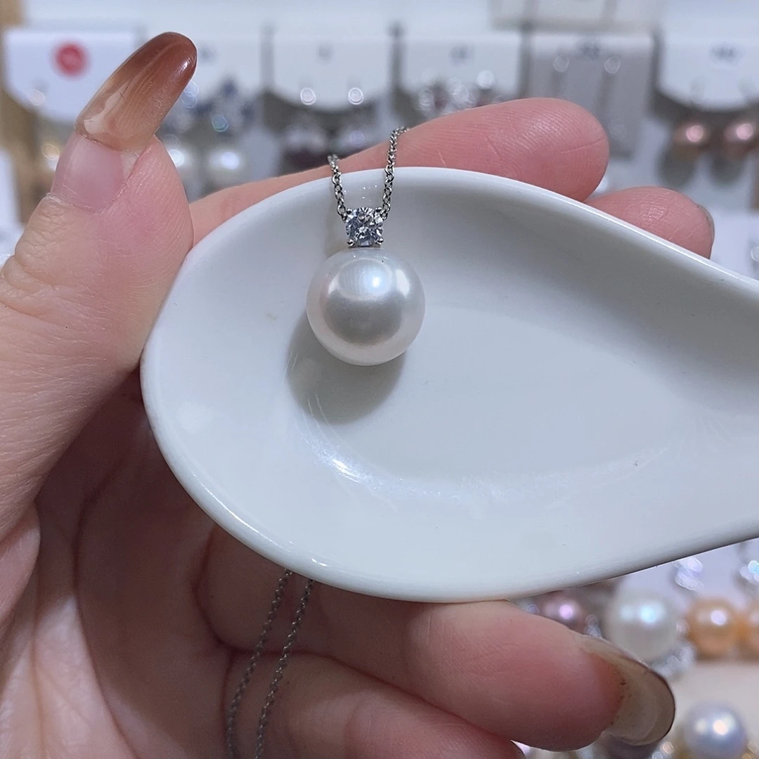倩***儿银S925镶嵌吊坠(赠链)淡水珍珠w12