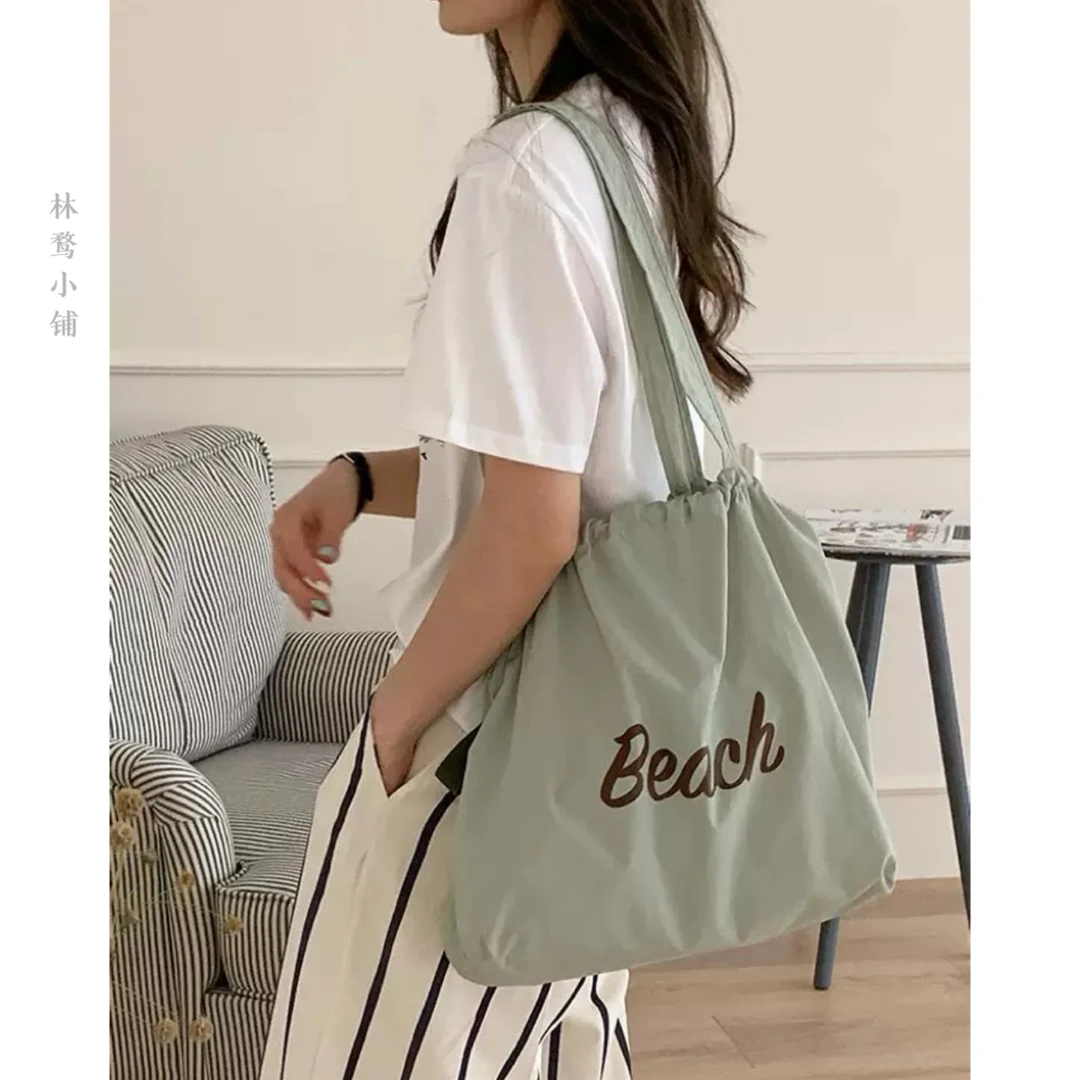 学院风字母帆布包包女2025新款潮韩国托特包休闲大容量购物袋包
