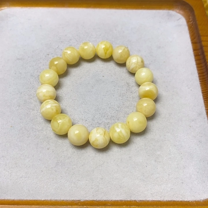 萌****裸石蜜蜡未镶嵌手串