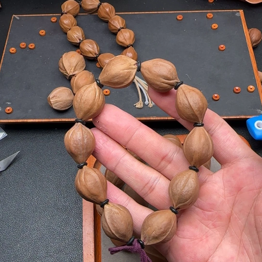 橄榄核18*24三面佛梅林铁核