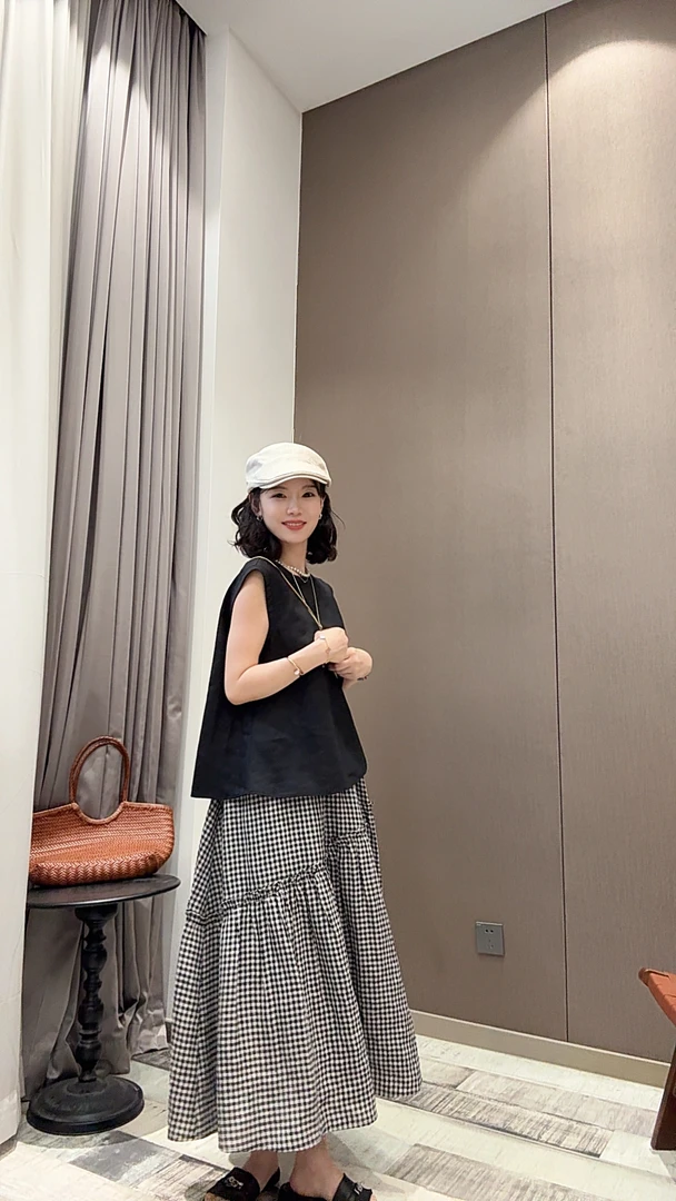 【618专属】松紧腰法式黑雨露格子不规则高腰A字半身裙女长款25199