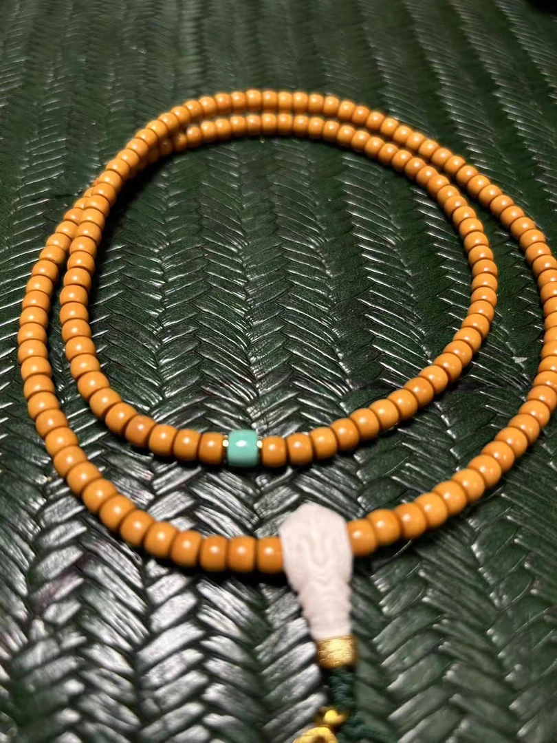 5.5橄榄核精品核尖长串脖挂