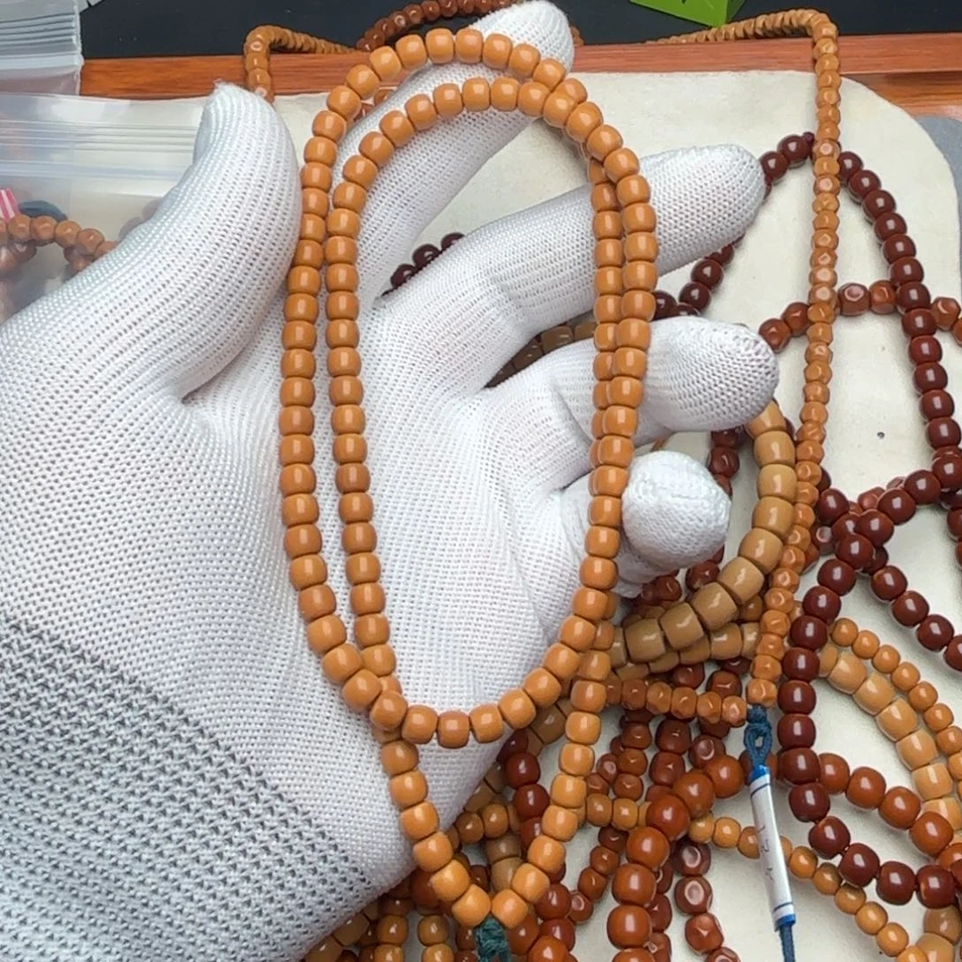 春***美橄榄核手串老挝核尖长串5.8直切微倒角