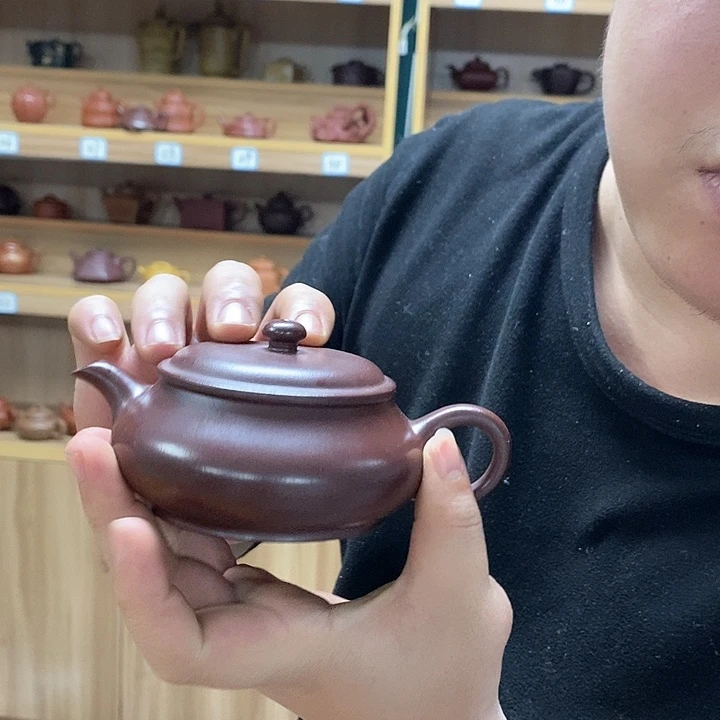 紫砂茶壶献愁供恨哈哈