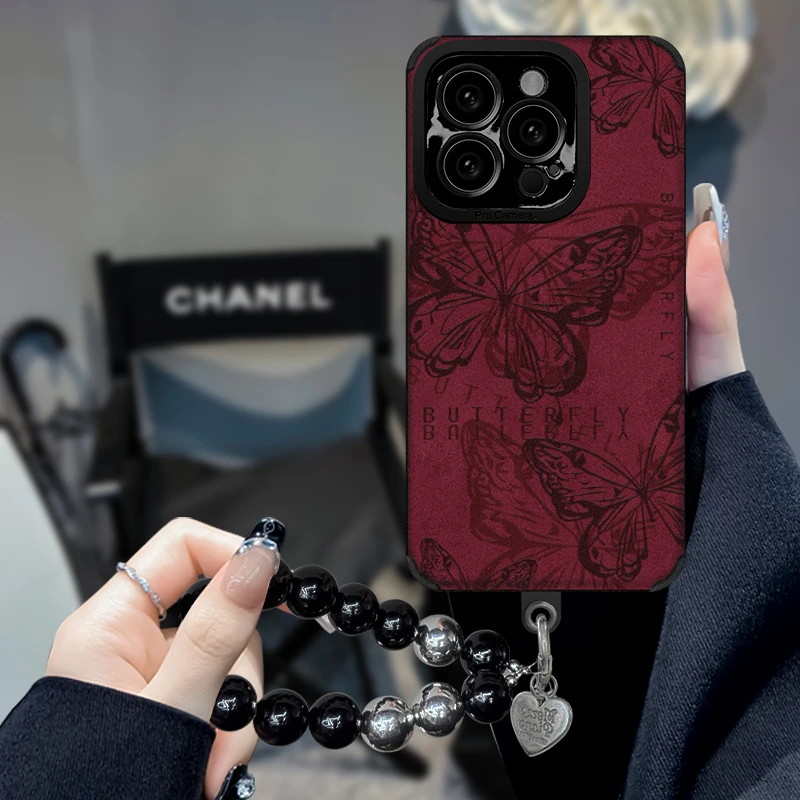 线条红蝴蝶适用苹果16pro华为vivo小米oppo手机壳皮质高级防摔ins