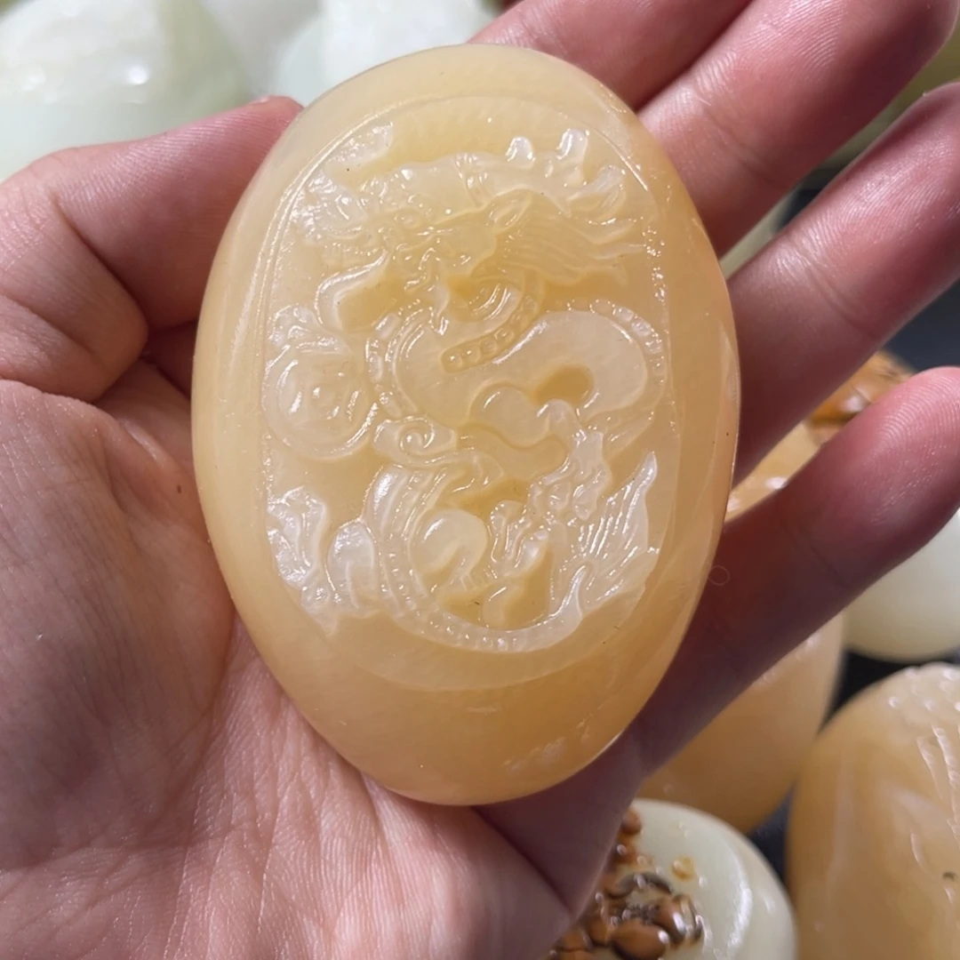 米***果石材天然方解石手把件不退换