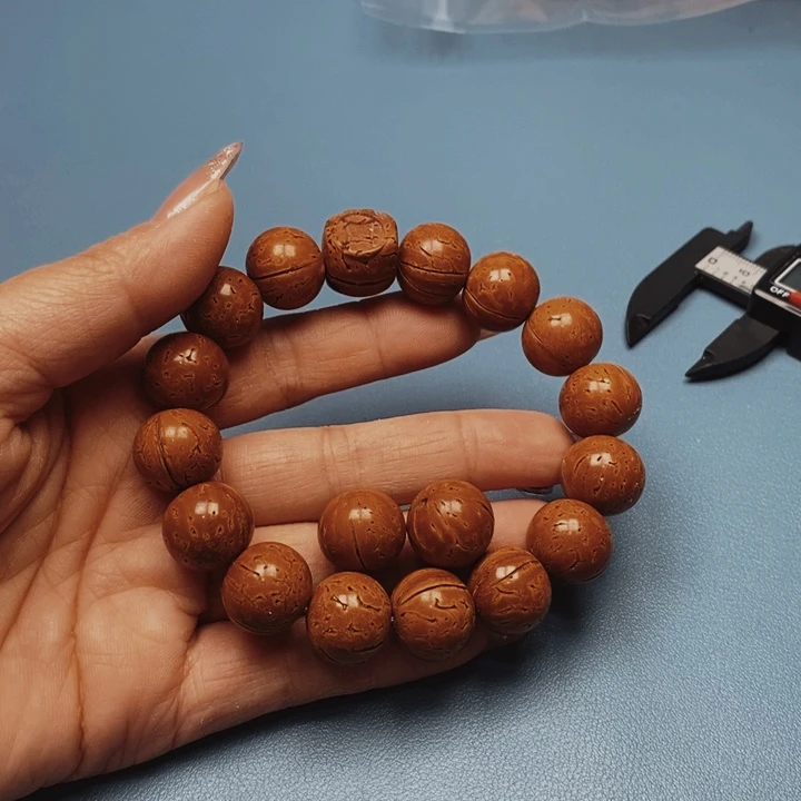 桃核手串极限圆16花皮色差15颗