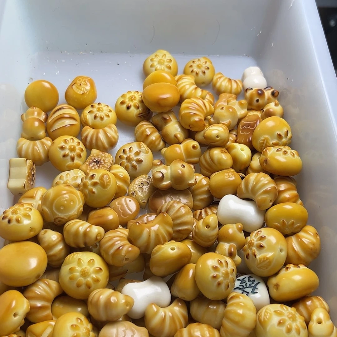 菩提根/象牙果吊坠瑕疵炭烤混2颗表面孔道有裂