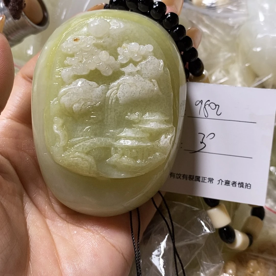 石材u****2古青石手把件